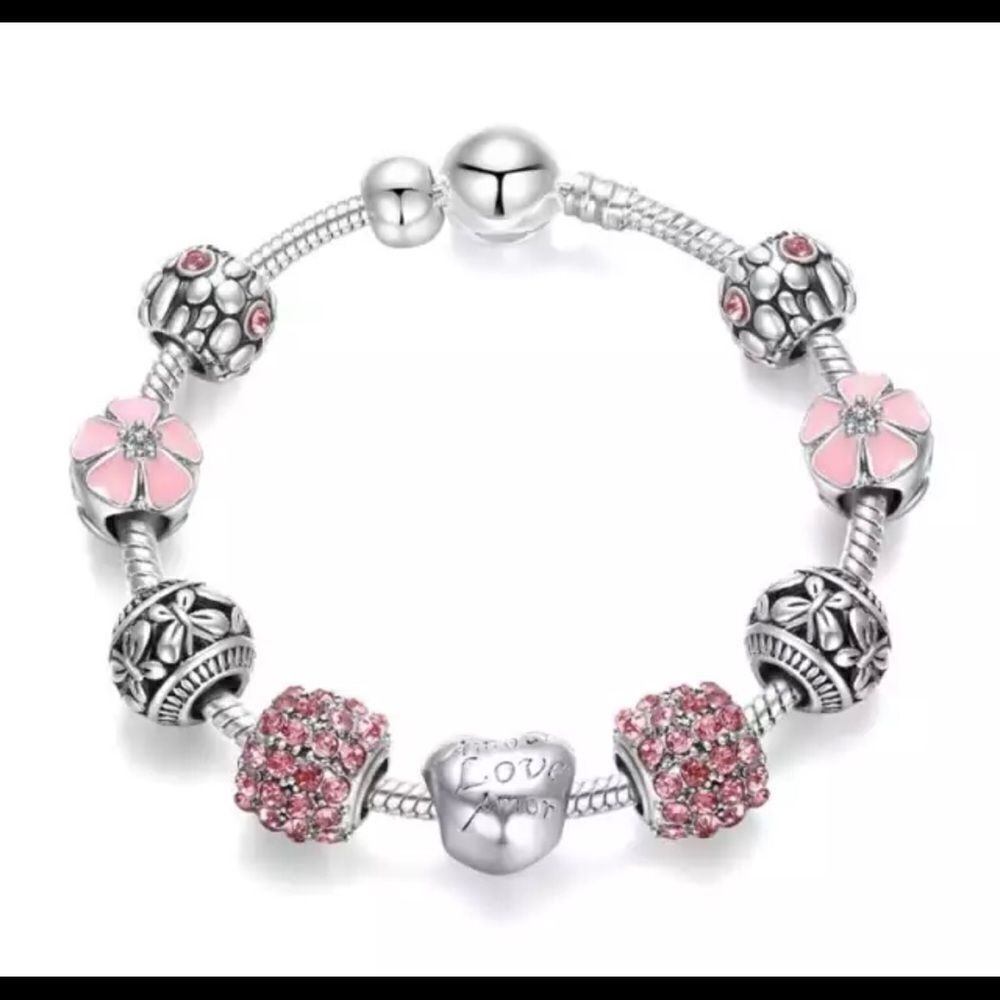 TRENDYβPINKΒ 9βPIECEβCHARMβBRACELETβ
